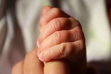baby's left hand thumbnail