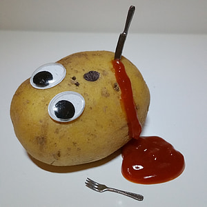 photography of knife on potato thumbnail