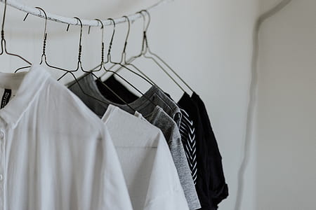 white polo shirt on clothes hanger thumbnail