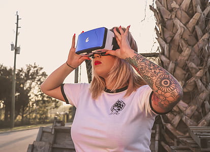 Photo of a Woman Using Virtual Reality Glasses thumbnail