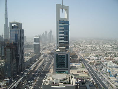 aerial photography of blue and white building thumbnail