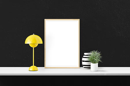 yellow table lamp turned off on desk thumbnail