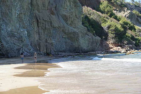two person walking on seashore thumbnail