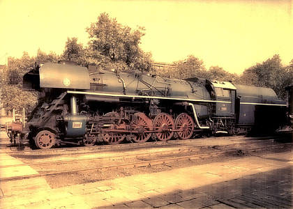 black train on railroad thumbnail