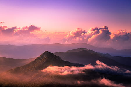 aerial view photography of mountain covered with clouds thumbnail