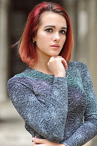 woman with hands on chin thumbnail