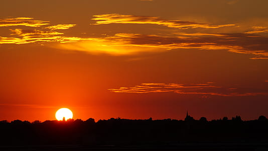 Sunset View With a Silhouette of Trees thumbnail