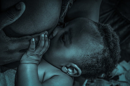 gray scale photo of baby thumbnail