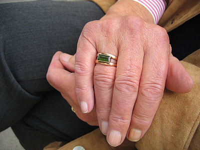 two people holding hands thumbnail