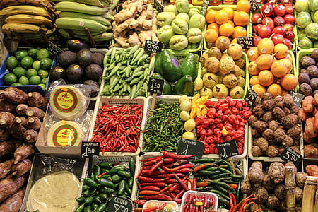 assorted fruits and vegetables in plastic baskets thumbnail