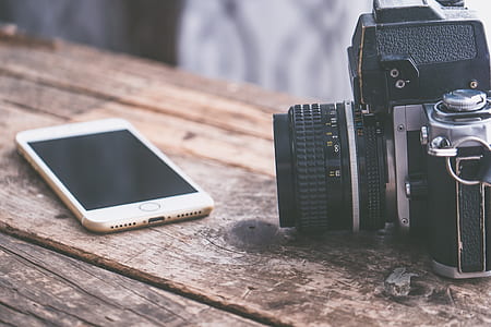 black DSLR camera thumbnail