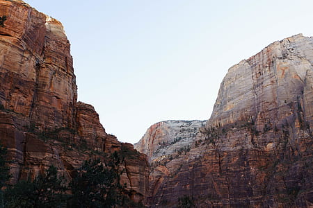 brown and gray mountains under white sky during daytime thumbnail