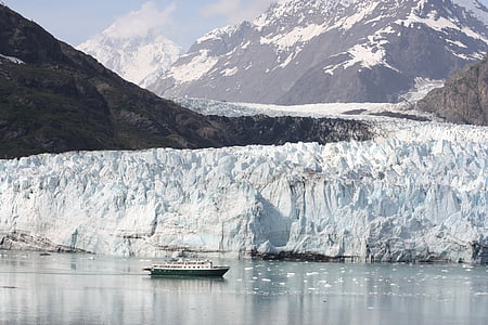 white and black boat on calm body of water thumbnail