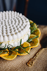 Meringue Cake with whipped cream and oranges thumbnail