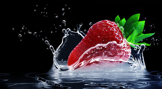 time lapse photography of strawberry splashing on water thumbnail