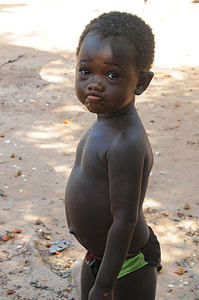 boy in black underwear standing on ground thumbnail