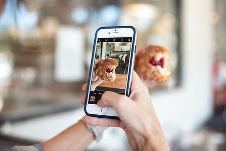 person taking photo of a pie thumbnail
