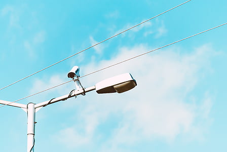 white CCTV camera on lamp post thumbnail