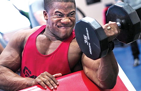man holding 35 Lbs dumbbell thumbnail