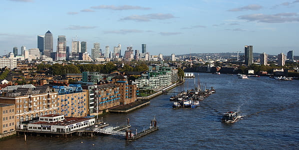 high angle photography of cityscape and body of water thumbnail