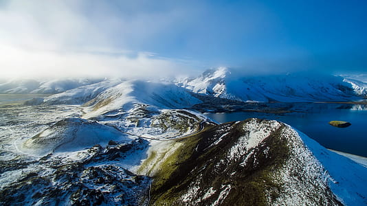 Scenic View of Mountain Range Against Sky thumbnail