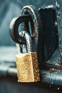 Close-Up Photography of Wet Padlock thumbnail