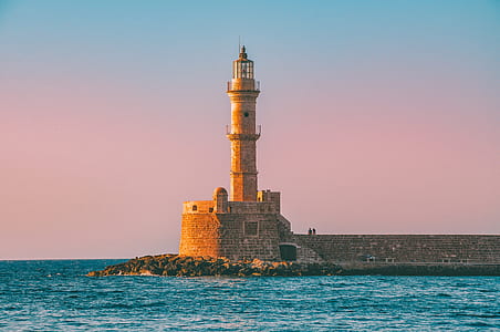brown brick tower on sea thumbnail