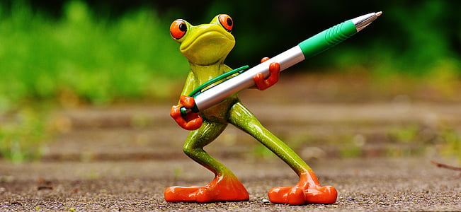 green and red frog figurine thumbnail