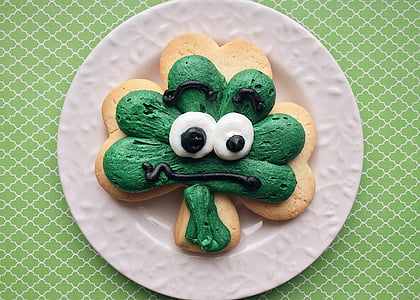 clover cookie on white ceramic saucer thumbnail
