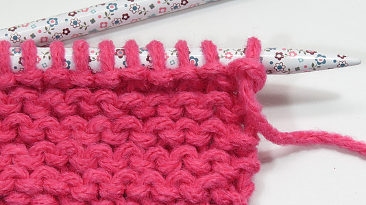 pink knitted yarn thumbnail