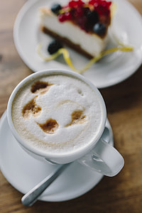 Cup of coffee and berry cheesecake thumbnail