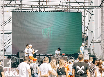 People Gathered in Front of Stage thumbnail