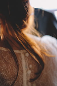 woman wearing white lace top thumbnail