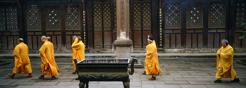 group of person wearing yellow robe thumbnail