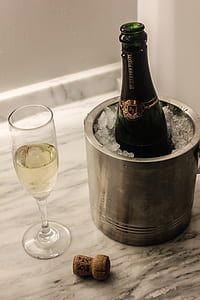 champagne bottle and clear champagne flute thumbnail
