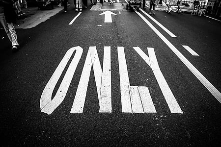 greyscale photography of street with only paint thumbnail