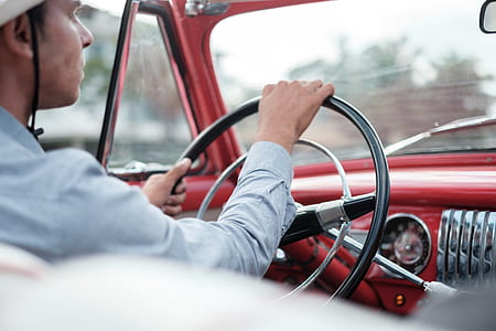 man driving vehicle at daytime thumbnail