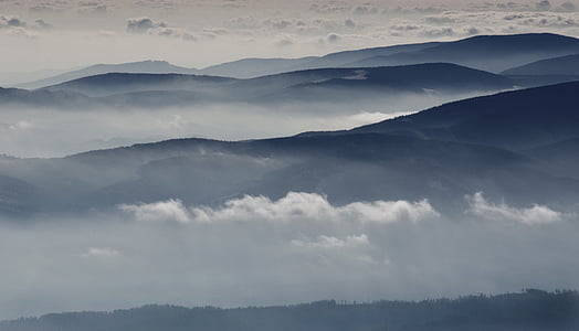 birds eye photography of mountain with clouds thumbnail