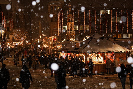 group of people walking while snowing thumbnail