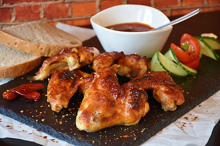 grilled chicken with sauce and bread dish thumbnail