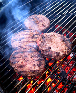 meat patty on grill in close-up photography thumbnail