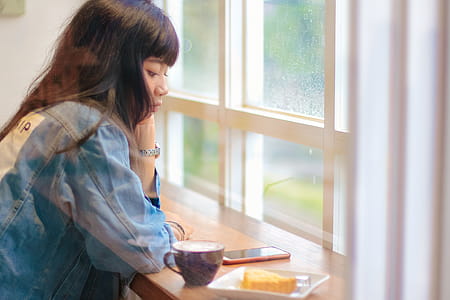 Woman In Blue Denim Jacket thumbnail