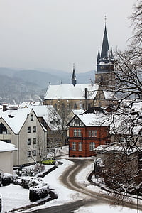 gray buildings covered on snow thumbnail