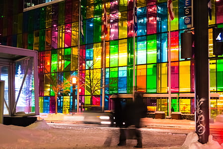 multicolored glass building during nighttime thumbnail