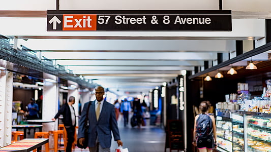 man walking inside building thumbnail