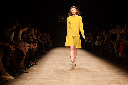 woman walking on stage thumbnail