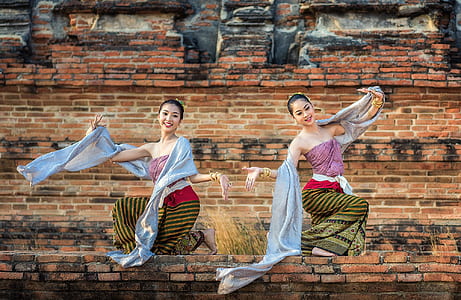 two woman dancing thumbnail