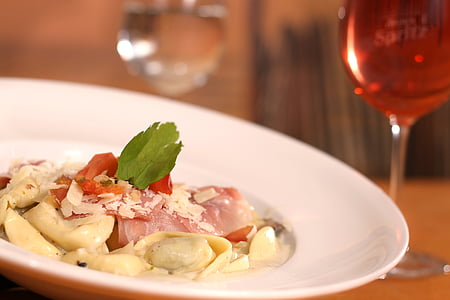 cooked food beside wine glass thumbnail