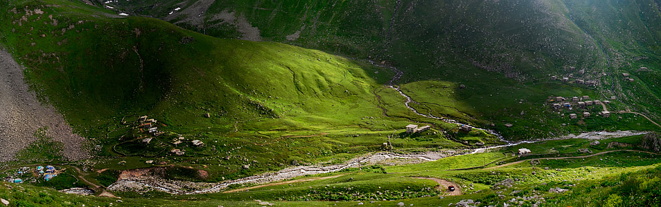 green field during daytime thumbnail