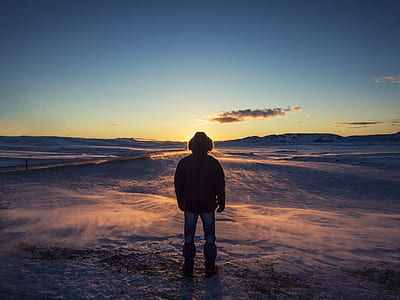silhouette photo of man outdoor during golden time thumbnail